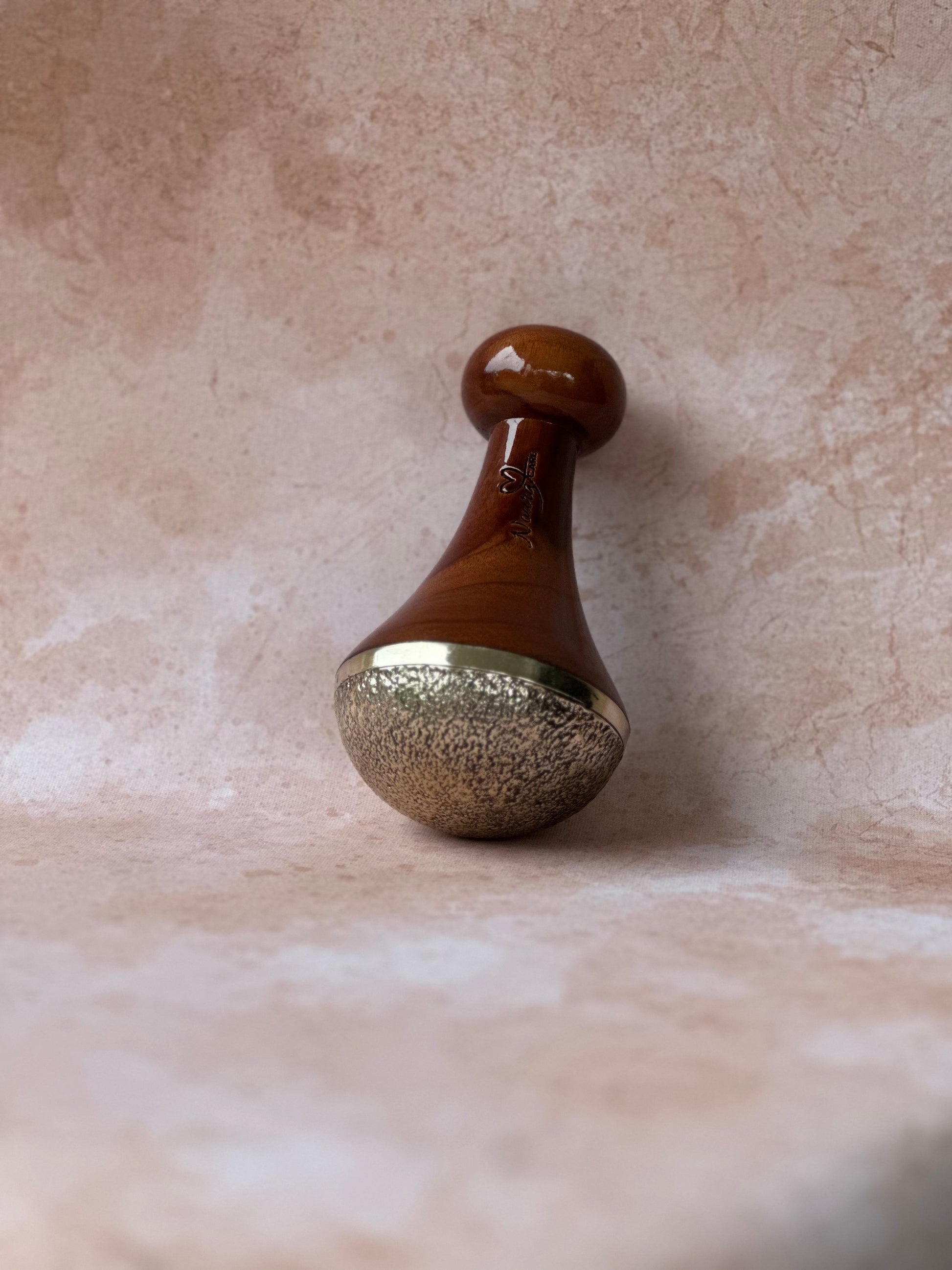 Kansa Foot Wand to massage the soles of the feet and calm the nervous system.